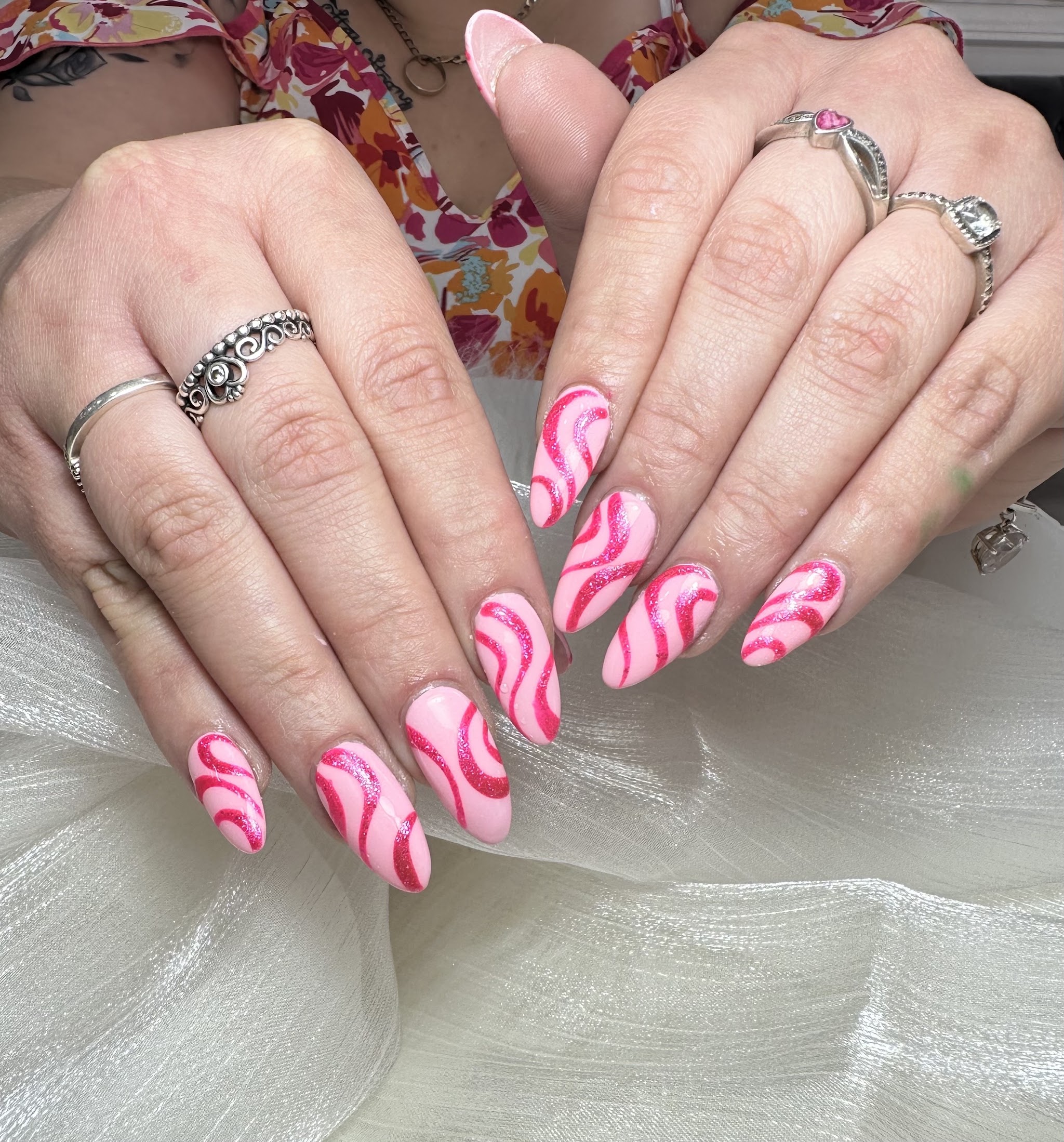 Pink swirl almond nails