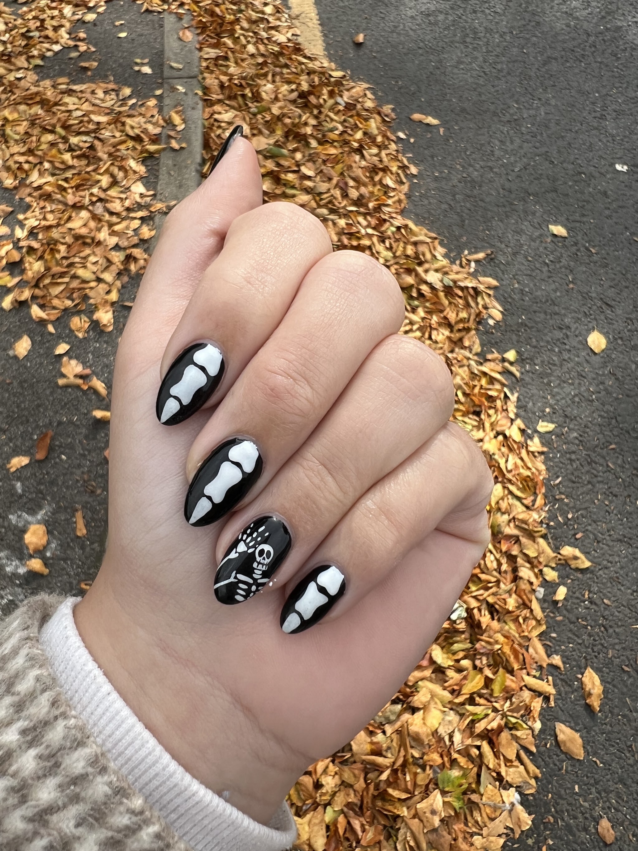 Black and white ghosts among the autumn leaves