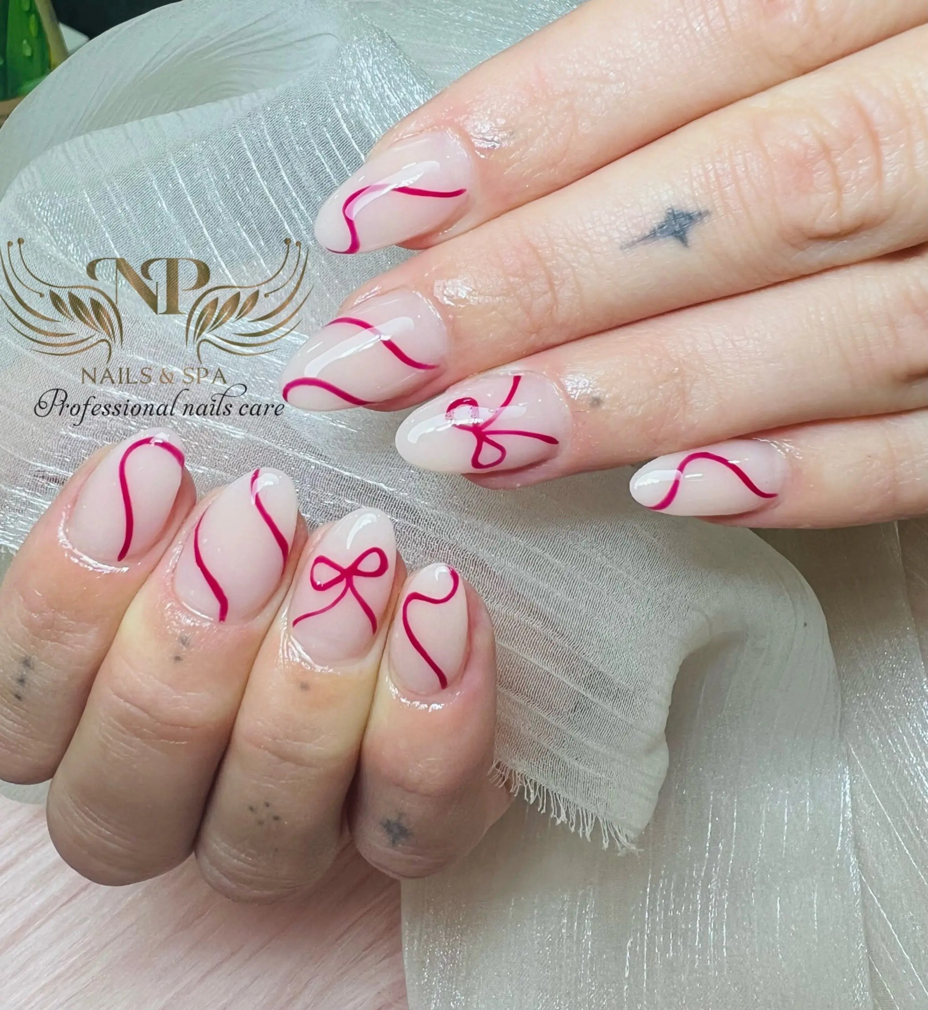 Nude nails with red ribbon and bow line art