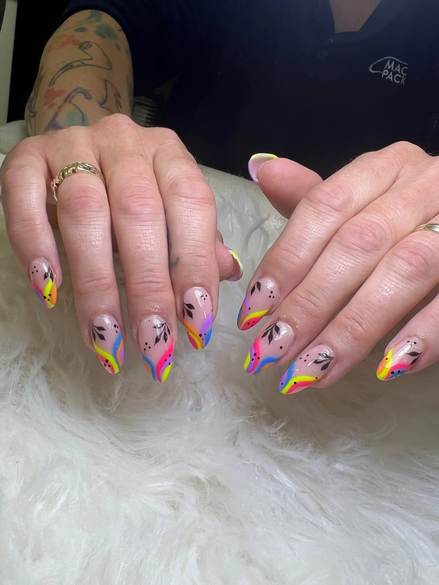 Multicolour swirls with black line art