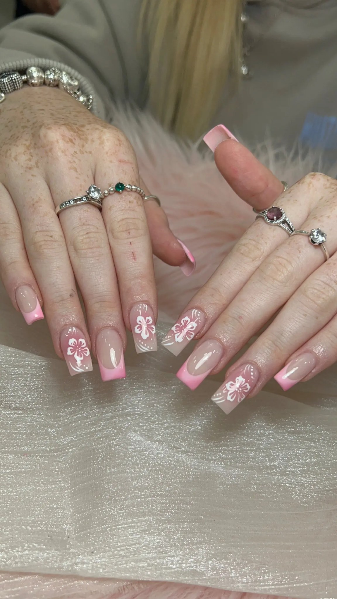 Pink French square nails with floral art